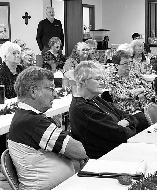 Hennessey senior citizens learn to avoid scammers at banking workshop by learning to just ‘tap’ cards