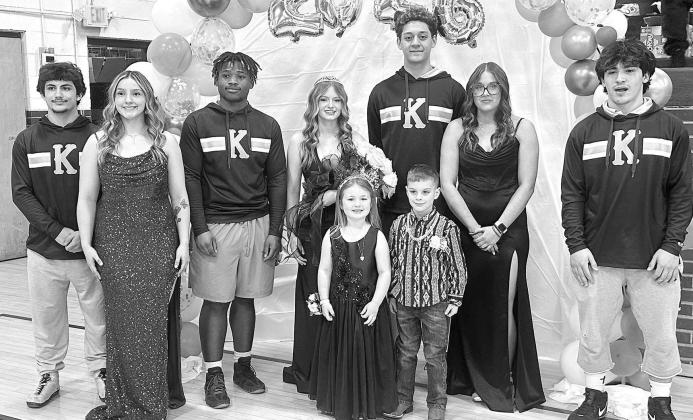 WRESTLING ROYALTY – Andrew Takape was named the KHS wrestling homecoming king and Sydnie Toepfer crowned the queen at coronation ceremonies on Tuesday at Heritage Gym. Members of the homecoming court were, from left, Brayden Kochenower, Cattie Crum, TJ 