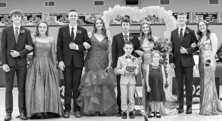 LOMEGA ROYALTY – Hensley Eaton and JesseJames Johnston were crowned homecoming queen and king prior to Lomega High School’s games against Burlington last Friday. Members of the homecoming court were, from left: Owen Duffy, Allie Roberts, Kelby Ott, Sy Lomega gets homecoming sweep