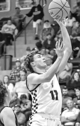 JETT MUEGGENBORG has helped lead Okarche to an 11-0 record entering the Christmas holiday. [Photo by Chris Simon/ www.simon-sports-photos.smugmug.com]