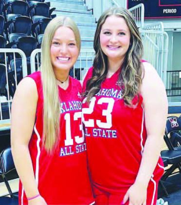 RECENT LOMEGA graduate Sydni Walker makes a move in the post (above) during her team’s Class B state quarterfinal game in March. Walker played her final high school game last Saturday when she (23 on the right) joined Lomega teammate Darcy Roberts (13) ‘Toughest player I ever coached’