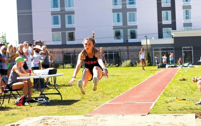 Taylor soars to 3 golds, 1 silver