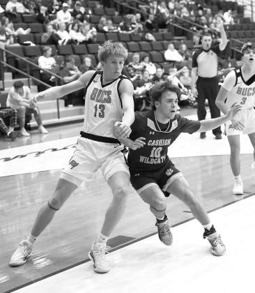 CASHION’S Kamden Miller (10) battles for position in the championship game against Tonkawa last weekend in Garber. [Photo provided]