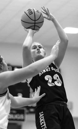 RAEGAN SNIDER attempts a shot against Alva in the semifi nals. The KHS senior earned all-tournament honors. [Photo by Russell Stitt/www.stitt.smugmug.com]