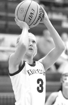 KHS SENIOR Abbie Myers shoots a short jumper during the first half of Kingfisher’s district championship game against Cushing. She scored 12 in the Lady Jackets’ victory. [Photo by Russell Stitt/www.stitt.smugmug.com]