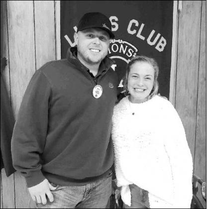 KHS JUNIOR Cora Taylor, right, Kingfisher County Distinguished Young Women winner, with Kingfisher Lions Club member Zach Meyer. Taylor was the guest speaker at last week’s Lions Club meeting.             [KT&amp;FP Staff Photo]