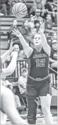 LOMEGA’S Brayli Walker shoots a 3-pointer during the quarterfinals of the tournament in Mulhall-Orlando. She and her teammates combined for 28 3-pointers the following day. [Photo by Chris Simon/www.simon-sports-photos.smugmug. com]