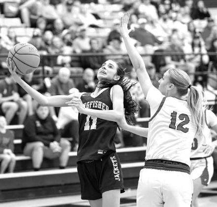 KINGFISHER’S Ela Hartman (left) goes up for a shot against Washington’s Eternity Self (12) during the championship game. Hartman scored a game-high 17 points. Pictured right is Reese Roof shooting a 3-pointer as Washington coach Kale Simon looks on. [ KINGFISHER’S Ela Hartman (left) goes up for a shot against Washington’s Eternity Self (12) during the championship game. Hartman scored a game-high 17 points. Pictured right is Reese Roof shooting a 3-pointer as Washington coach Kale Simon looks on. [