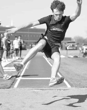 KINGFISHER’S Reese Roof (above) closed strong to help her 800 relay team win the gold medal Tuesday at the Fairview Track and Field Meet. Lomega’s Kinsley Fisher (right) won silver in both the discus and shot put while Kingfisher’s Chase Boarts (bel