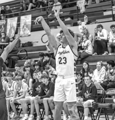 JACKSON WILLBANKS scored 12 points Monday as Kingfisher defeated Pond Creek-Hunter for the consolation championship at the Wheat Capital Tournament. [Photo by Chris Simon/www.simon-sports-photos.smugmug.com]