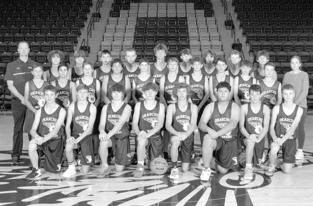 OKARCHE WARRIORS – Members of the 2022-23 Okarche junior high boys basketball team include, from left: front row, Colton Wright, Andrew Walker, Kysen Avila, Brett Carnott, Colin Hendrickson, Vance Becerra, Austin Walker, Tyler Marinelli; middle row, Wya OKARCHE JUNIOR HIGH