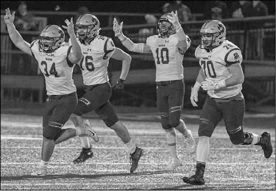 CASHION DEFENDERS Jacob Farrow (34), Colten Ogletree (76), Brexten Green (10) and Gunner Simpson (70) head to the sidelines after making a big stop against Pawnee in last week’s semifi nal win. [Photo by Brad Ringling getting defensive in quest for title