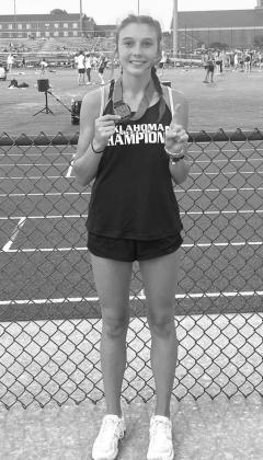 Taylor wins long jump at Meet of Champions