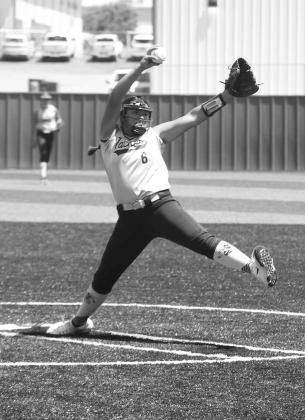 KHS SOPHOMORE Bella Gomez delivers a pitch during Kingfisher’s opening game of the Highway 33 Classic softball tournament on Thursday. Gomez came on in relief of the Lady Jackets’ 7-0 loss, but she started and got the win later in the day when they de Gomez delivers as KHS earns first win