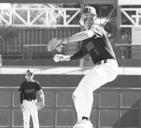 EASTON ROBY delivers a pitch during last fall’s state championship game. Roby picked up one of Okarche’s wins in Alabama last week as the Warriors went 3-1 on their Spring Break trip. [KT&amp;FP Staff Photo]