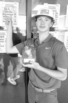 ABOVE: KHS golfer Hayes White watches from behind as Luciano Orozco hits his tee shot on the ninth hole during Wednesday’s round. LEFT: Cale Reagan watches his chip shot head toward the green on the back-nine. RIGHT: OCS golfer Ainslie Stanford fired an ABOVE: KHS golfer Hayes White watches from behind as Luciano Orozco hits his tee shot on the ninth hole during Wednesday’s round. LEFT: Cale Reagan watches his chip shot head toward the green on the back-nine. RIGHT: OCS golfer Ainslie Stanford fired an