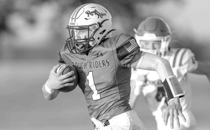 CASHION QB Kellen Smith, pictured in a game against Ringling earlier this season, threw for four touchdowns, rushed for more than 100 yards and picked off a pair of passes Thursay in his team’s win at Crescent. [Photo by Brad Stone/www.bestone.shootproof.com]
