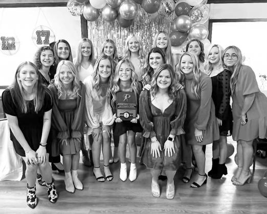 HENNESSEY HIGH SCHOOL’S 2021 fast-pitch softball players celebrate their season and OSSAA academic achievement award during their second annual banquet Nov. 4. Pictured are, from left: front row, manager Ezri Vaverka and HHS seniors Mailey Scott, Harlee Hennessey softball team earns OSSAA academic award