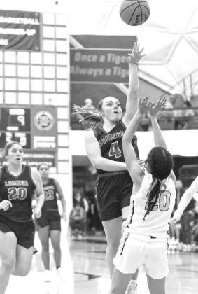 Defense pushes Lomega past Latta