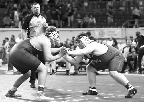 CASHION SENIOR Matthew Stockton (pictured on the right in the left photo) and Hennessey freshman Kason Scruggs (right) were able to gain wins in their respective weight classes at the Class 3A state wrestling tournament. [Photos by Anjelica Newcomer]