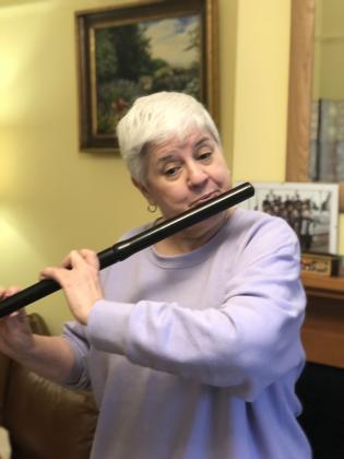 Virginia Giglio plays the timber flute. Article Image Alt Text