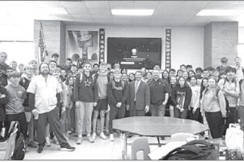 ASSOCIATE DISTRICT Judge Lance Schneiter stands in the middle of a sea of about 120 Kingfisher High School freshman who joined him for a presentation on the influence of Native American governments on the framers of the U.S. Constitution as well as the re