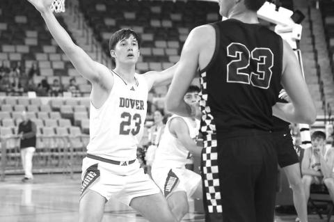 DOVER SENIOR Brennan Fletcher guards Granite’s Eagen Carter during the Longhorns’ quarterfinal win on Tuesday. [KT&amp;FP Staff Photo]