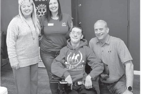 ROTARY SPEAKER Brittany Hewitt, second from left, community engagement manager of Savannah Station, is pictured with Rotarian Darcy Reherman, far left, and Hunter and Jeff Wittrock, guests of the club last Tuesday. [KT&amp;FP Staff Photo]