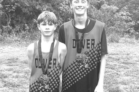 Two Dover Longhorn runners medaled in the junior high boys race Saturday, Aug. 30, at the Watonga High School Invitational. Hunter Spradlin, left, placed 11th out of 115 competitors. He ran the 2,500 meter course in 9:26.7. His teammate Brady Reese placed