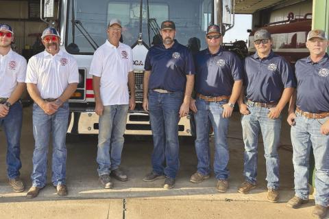 OMEGA Fire Department, from left: Captain Kelly Schweitzer, Chief B.J. Waeger, Lieutenant Brandon Yost and Firefighters Laramie Lopp, Tyler Farrar, Hunter Wiens and Jon Glazier. Not pictured are: Assistant Chief Sid Smith, Andrea Murray, Matt Murray, Crai