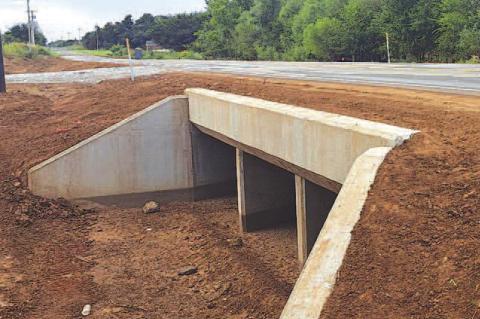 THREE MAJOR road projects in Kingfisher County’s District 2 have been completed. They are on Dover-Crescent Road (top), Beard Blacktop (bottom left) and Sheridan Road (bottom right). [KT&amp;FP Staff Photos]