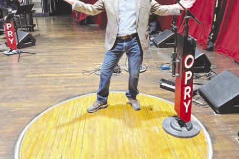 MARK BEUTLER poses with Pam Tillis at the celebration of her 25th anniversary of performing at the Grand Ole Opry. He also had the opportunity to stand inside the famed Grand Ole Opry Circle. [Photos provided]