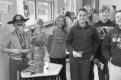 Okarche fourth graders gather, present data on national p