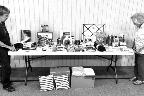 DONATING TO VETERANS – Marge Patocka and Kathy Patocka prepare to pack the items for transport to the Oklahoma City VA Health Care System for the Farmerettes OHCE group. Members collected the items to be donated. [Photo provided]