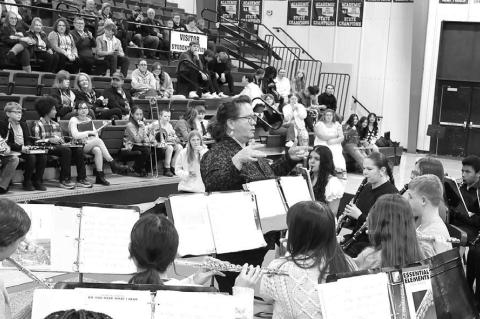 KPS BAND Director Mandy Owens conducts during the Christmas concert held in December. It’s one of several performances and appearances made by the band outside of multiple competitions during the school year. [Photo by KHS Photography]