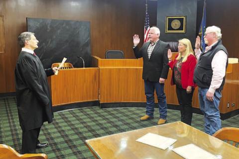 Dobrovolny among those sworn in, re-elected county commission chair