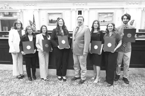 RCC STUDENTS were recently honored at the state Capitol by the Oklahoma Association of Community Colleges for their outstanding academic achievement, record in the classroom and leadership ability. RCC President Jena Marr, left, and Rep. Dick Lowe, center