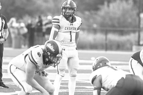 CASHION QB Kellen Smith, picutred in the team’s season opener against Hennessey, accounted for more than 300 yards of offense last Friday, but the Wildcats were ousted from the playoffs in a 24-14 loss at Minco. [Photo by Rylee Broadbent]
