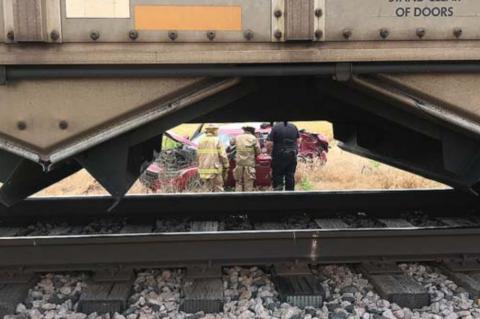 Hennessey train, car collide; driver escapes serious injury