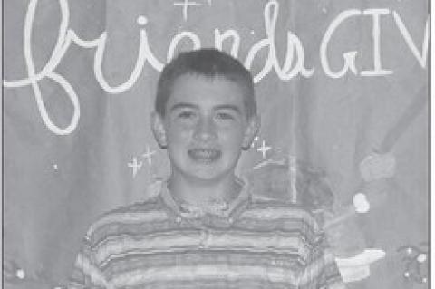 CASHION FFA member Jaxton Bailey-Casey at the November chapter meeting after winning the Member of the Month Award. [Photo by Molly Mayes/Cashion FFA Reporter]