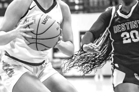 ABBIE MYERS works to put up a shot during Friday’s game against Destiny Christian. The senior scored 26 and hit the game winner for KHS. [Photo by Chris Simon/www.simon- sports-photos.smugmug.com]
