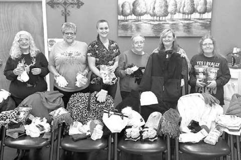 QUEEN BEES members pictured with items they donated to a local charity include, from left, Butcher, Wittrock, Cowan Neal, Rena Tollison, Von Pops and Amy Tollison. Not pictured, but donated: Britton and Bengs. [Photo provided]