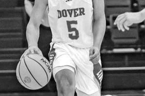 CASEN BUCK was one of the Dover Longhorns to make clutch free throws in the Skeltur Conference Tournament championship game. [Photo by Chris Simon/www. simon-sports-photos.smugmug.com]