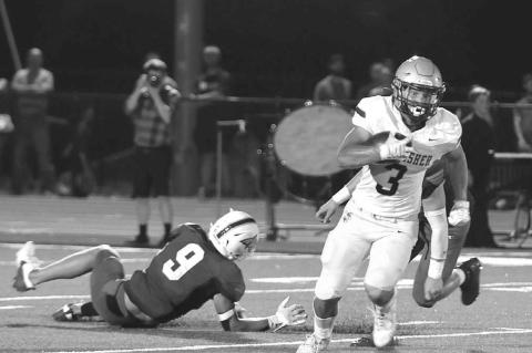 KASEN BLAIR is pictured breaking a tackle and taking off for the end zone. Blair had 156 yards and two touchdowns receiving in his team’s 35-6 win at Bridge Creek. [Photo by Hayden Green/KHS Photography]