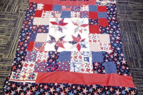 Local youth learn to quilt for a cause