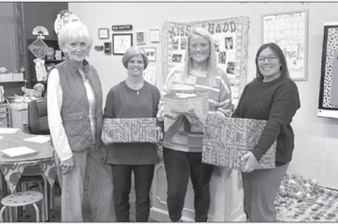 Local DKG chapter donates more than 150 books to OES teachers