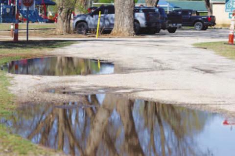 STANDING WATER normally isn’t that big of a deal, but it’s been several weeks since Kingfi sher has had any measurable rain. There was one report within the county of more than 3 inches. Big or small, experts say the rain may have just saved county cr