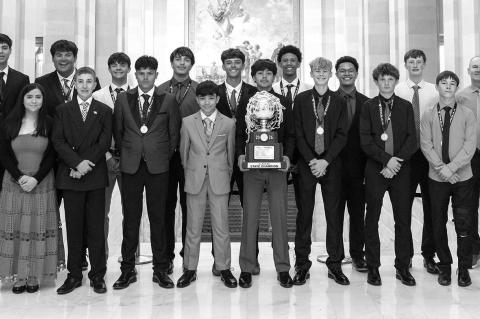 DOVER BASKETBALL state champion players and coaches pictured with Rep. Mike Dobrinski (far right) during a recent visit to the state Capitol include senior Brennan Fletcher; juniors Casen Buck, Ivan Ruiz and Randy Vitales; sophomores A.J. Avila, Daxx Comp