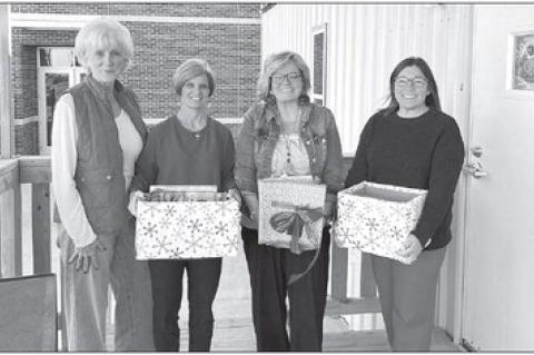 Local DKG chapter donates more than 150 books to OES teachers
