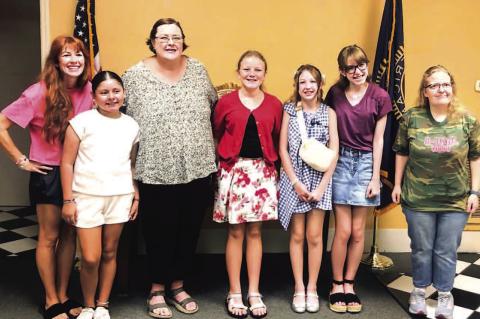 Local youth learn to quilt for a cause